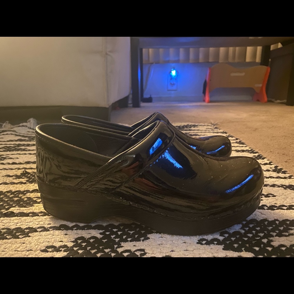 Dansko patented black leather clogs